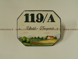 cod.art: nc46 - Mattonella in ceramica ottagonale cm 16x12 circa con paesaggio e scritta personalizzata. 